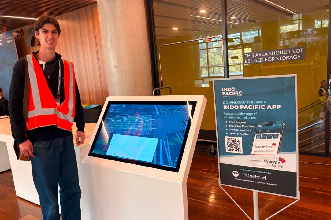 Conference expo hall with exhibitors and attendees